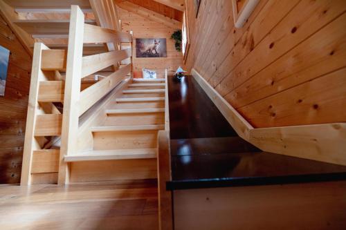 Leukerbad Apartment | Experience Chalet Regenbogen with Indoor Water Slide Fun