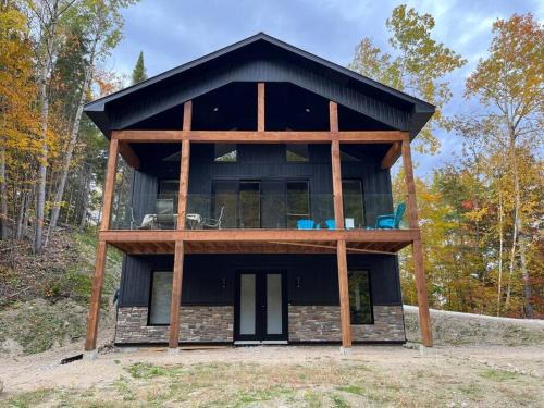 Mont Ste. Marie Ski Chalet | Chalet Relax with sauna steps from MSM lodge