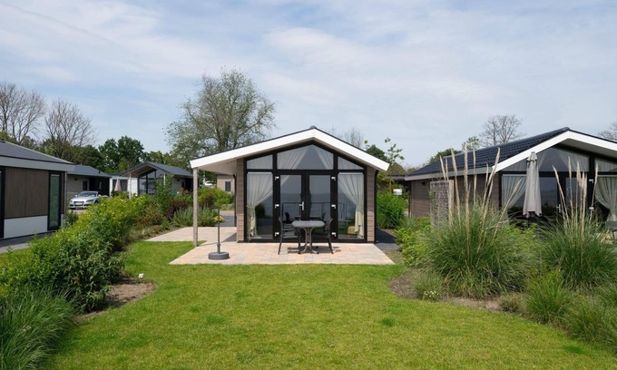 Municipality of Stede Broec House | Scenic Waterfront Chalet with Terrace & Family Amenities