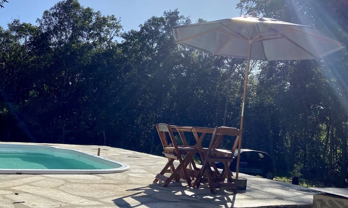 Pirenopolis Ski Chalet | Relaxing Chalet Suite with Heated Pool & Pet-Friendly Amenities