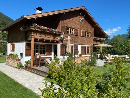 Kirchdorf in Tirol Ski Chalet | Experience the Comfort of Chalet Tirolia with Ocean Views