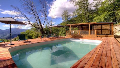 Guiselle Ski Chalet | Oceanfront CHALET U Castagnu with Pool & Family Amenities