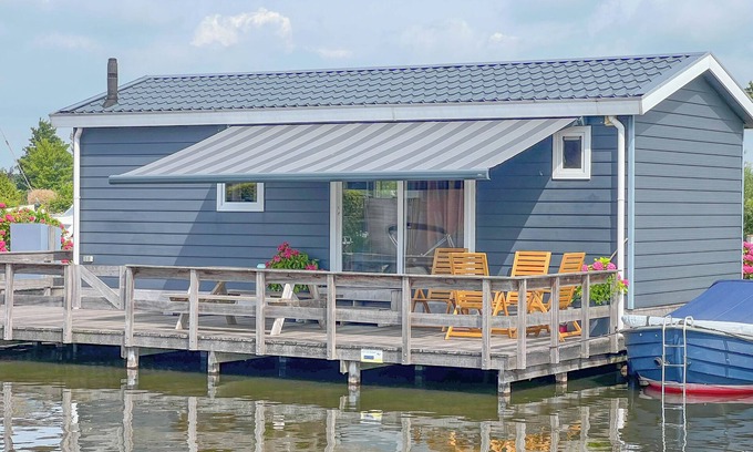 Municipality of Stichtse Vecht Ski Chalet | Beautiful Chalet with Swimming Ladder by Loosdrecht Lakes