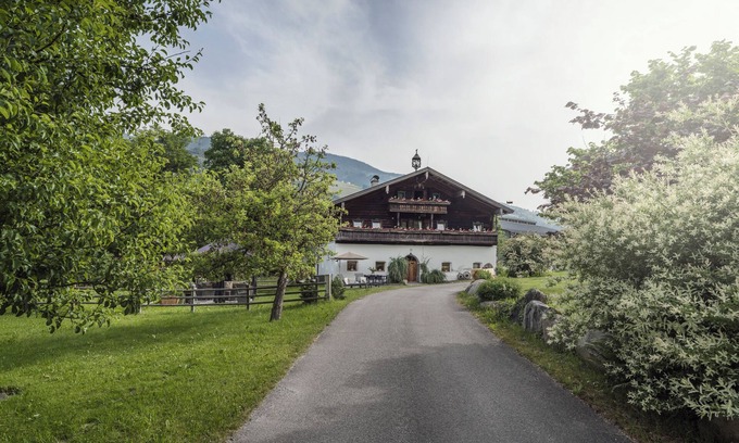 Taxenbach Ski Chalet | Experience Chalet "Wolfbachgut": Scenic Views & Spa Retreat