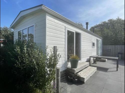 Burgh-Haamstede Apartment | Chalet Z 48: Oceanfront Retreat with Private Pool & Hot Tub