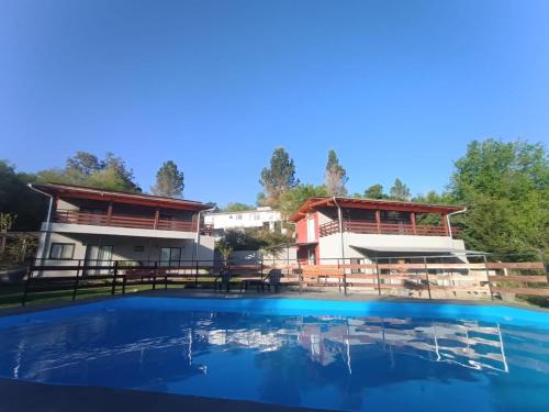Santa Rosa de Calamuchita Apartment | Inviting Chalets de la Paix with Pool & Family-Friendly Vibes