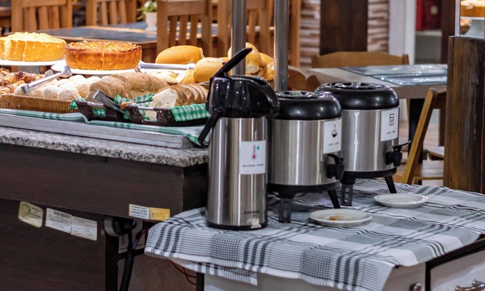 Vila Yolanda Hotel | Inviting Iguassu Suites Pousada: Pool, Spa & Family-Friendly
