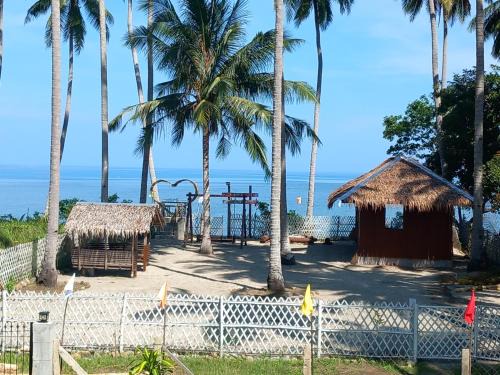 Quezon House | Charming Charme Del Mare Beach Resort with Oceanfront Views