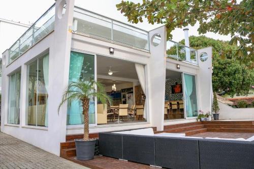 Florianopolis House | Exclusive Beachfront Retreat with Breathtaking Sunsets