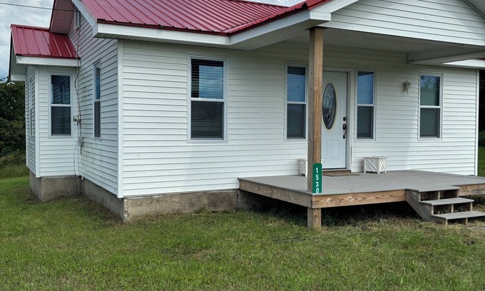 Ellsworth House | Charming 2-bedroom house on acreage in Ellsworth with stone fireplace and WiFi