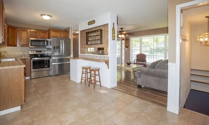 Topeka House | Charming 3-bedroom bungalow with fitness room, WiFi in soothing Topeka