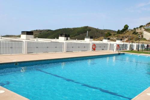 Almeria Apartment | Cozy 2-Bedroom Apartment with Pool and Garden at Enix Almeria