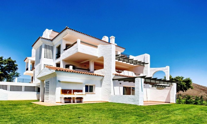 Ojen Apartment | Inviting Ground Floor Apartment with Infinity Pool & Sea Views
