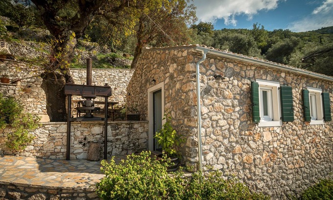 Petaleia House | Timeless Stone Retreat with Ocean View & Pool Access