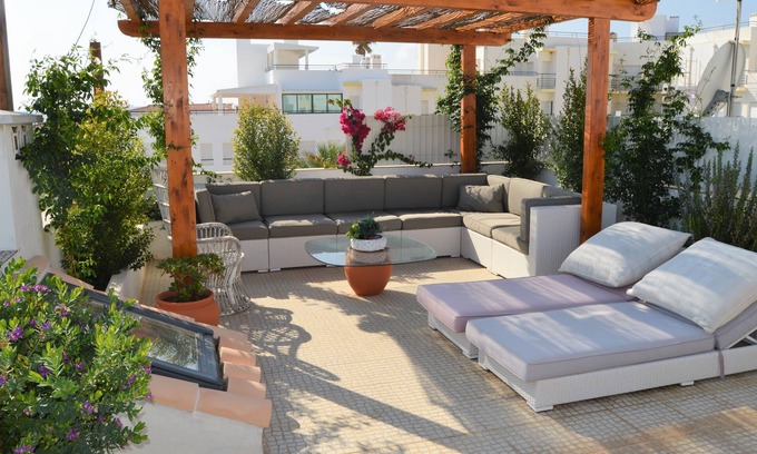 Meia Praia Apartment | Scenic Apartment with Rooftop Terrace Near Beach & Dining