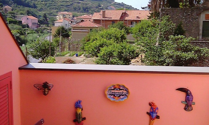 Finale Ligure Apartment | Cozy Attic Apartment with Terrace in Historic Building