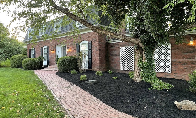 Carbondale House | Welcoming Brick Estate with Pool in Serene Carbondale