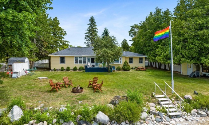 Cheboygan House | Guest Rated: 10/10 Burt Lake Cottage with Pool & Views