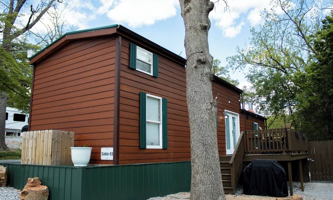Carthage Cabin | Inviting Cabin with Patio and Hot Tub by Scenic Pond