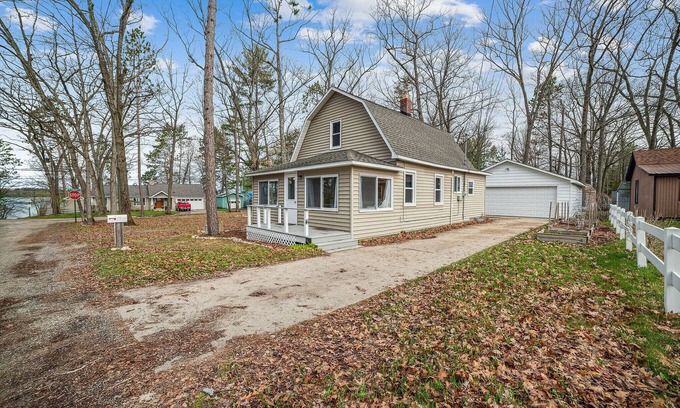 Grayling Cottage | Lakefront Cottage with Fire Pit & Family-Friendly Amenities