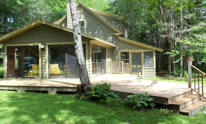 Weld House | Inviting Cottage with Deck and Scenic Lakefront Views