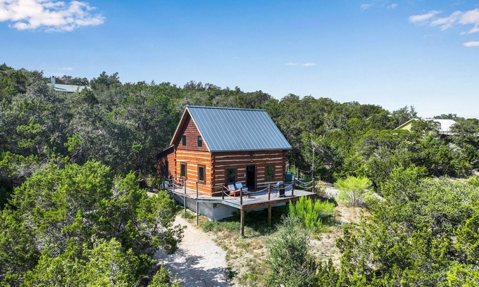 Fischer House | Custom Log Cabin Retreat with Spa and Hot Tub for Stargazers