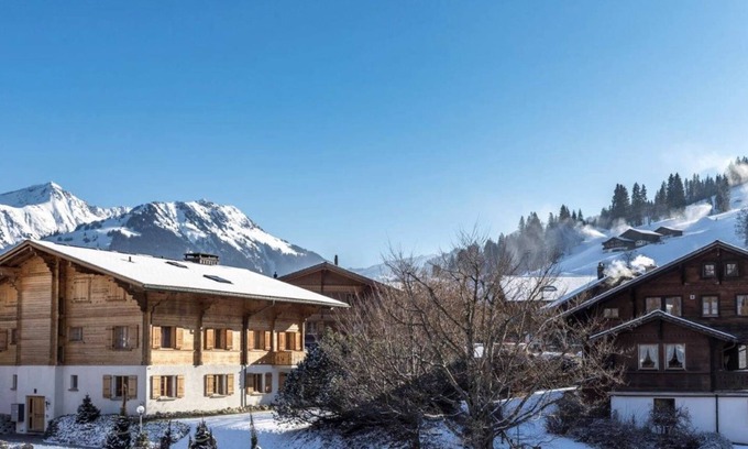 Saanen Apartment | Cozy Duplex Steps from Ski Slopes with Family-Friendly Amenities