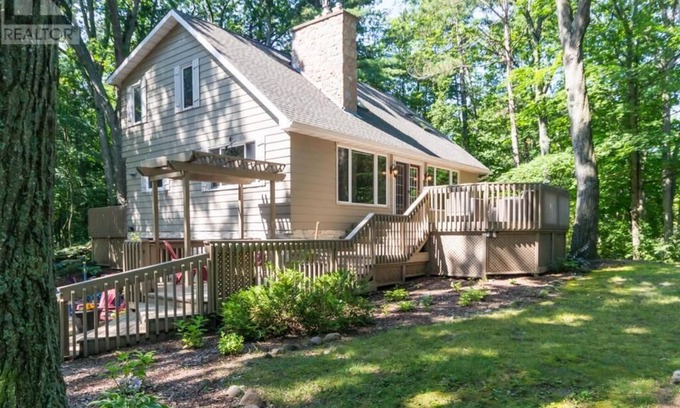 Grand Bend Cottage | Family Cottage Steps from Beach with Pool & Ocean Views
