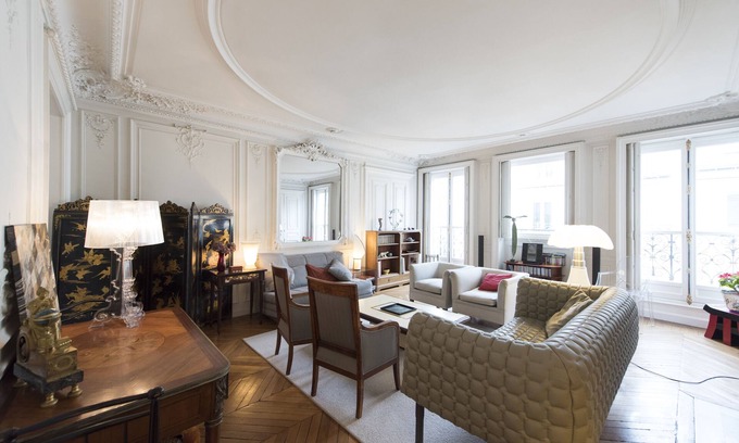 L'Europe Apartment | Elegant Haussmannian Retreat with Spa and Child-Friendly Perks