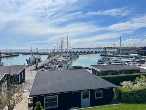 Rødvig House | Inviting Harbourfront Holiday Home with Ocean View