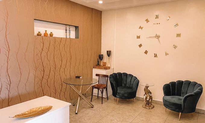 Cantonments Hotel | Charming hotel room in Osu