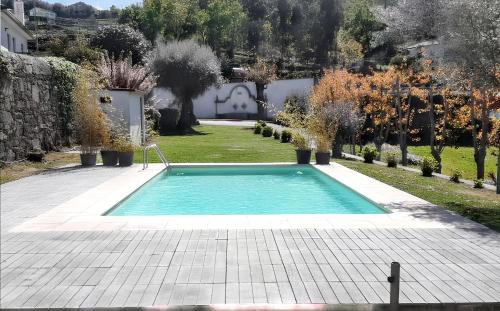 Povoa de Lanhoso House | Family Retreat at Covelas with Shared Pool & Enclosed Garden