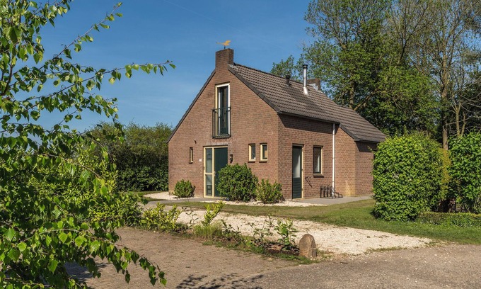 Ewijk Villa | Relaxing Lakeside Cottage with Hot Tub and Pool Access