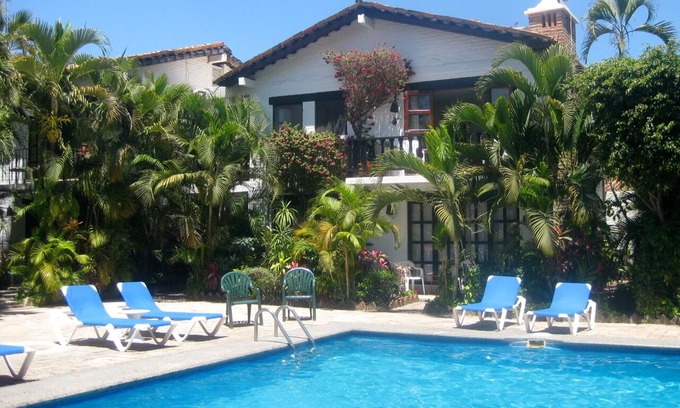 North Hotel Zone Condo | Beachfront Mexican Condo with Pool & Spa – Rated 10/10!
