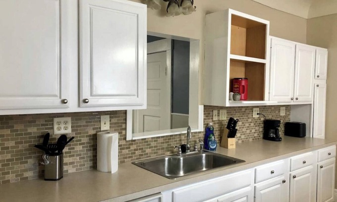 Wyandotte Apartment | Relaxing Retreat with Private Patio Near Detroit River