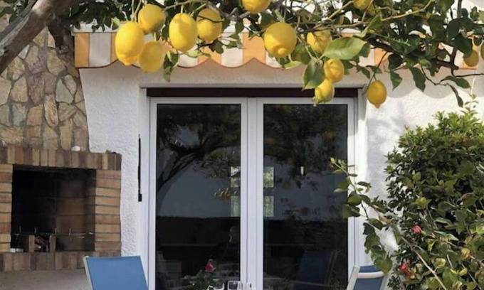 Llanca House | Renovated House Steps from Grifeu Beach with Garden Oasis