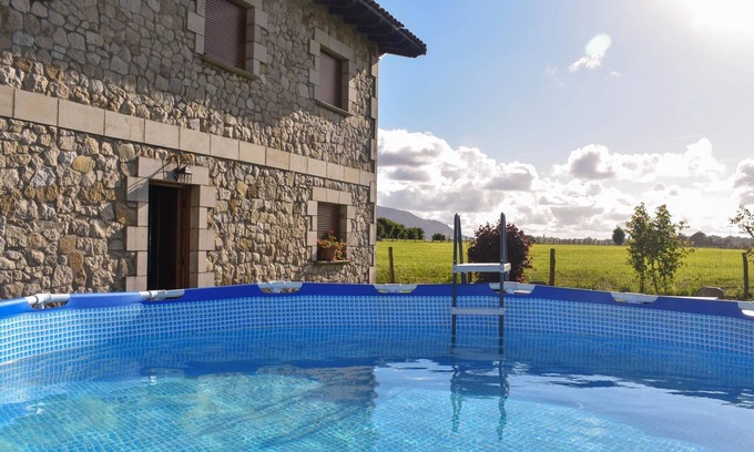 Ribamontan al Monte Villa | Inviting Rustic House with Spa and Pet-Friendly Comfort