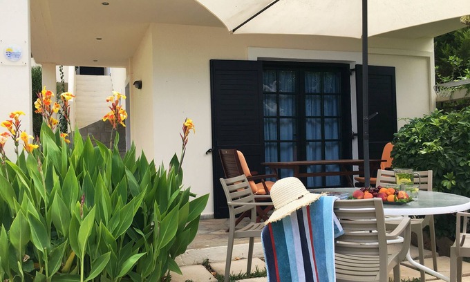 Kokkini Chani Apartment | Cozy Studio for 1-3 Guests, Steps from Kokkini Hani Beach