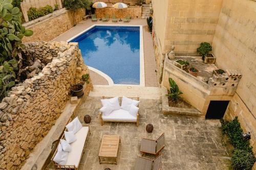 Xewkija Villa | Historic Farmhouse Retreat with Pool & Ocean Views
