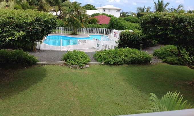 Saint-Francois Apartment | Guest Rated: 10/10 T2 with Pool & Ocean View for 4