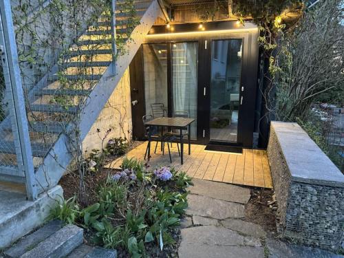 Lucerne House | Serene Garden Retreat for Two with Family-Friendly Amenities