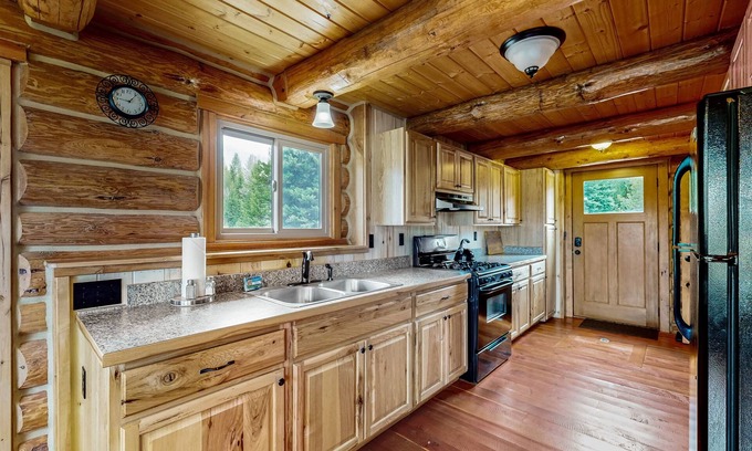 Polebridge Cabin | Inviting Two-Story Cabin with Kitchen Near Glacier National Park