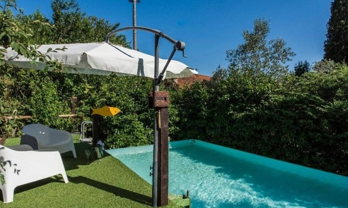 Rignano sull'Arno Villa | Inviting Villa with Private Pool and Lush Garden Retreat