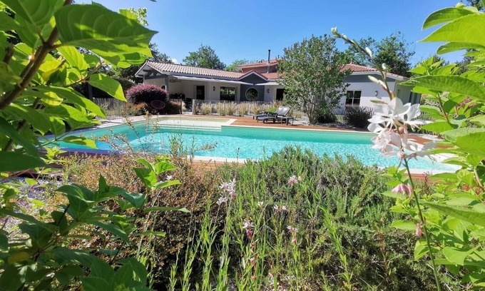 Biscarrosse House | Idyllic Villa with Heated Pool Surrounded by Lush Greenery