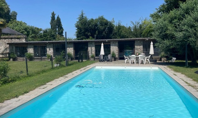 Assat House | Chateau Pool House: Oceanfront Escape with Pet-Friendly Perks
