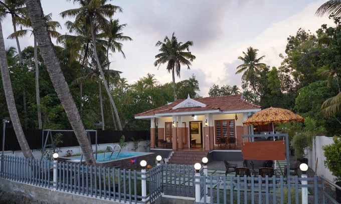 North Paravur Villa | Relaxing Cherai River View Pool Villa with Oceanfront Bliss