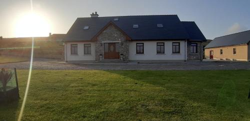 Ross Port House | Ocean View Retreat at Cherry Blossom in Erris