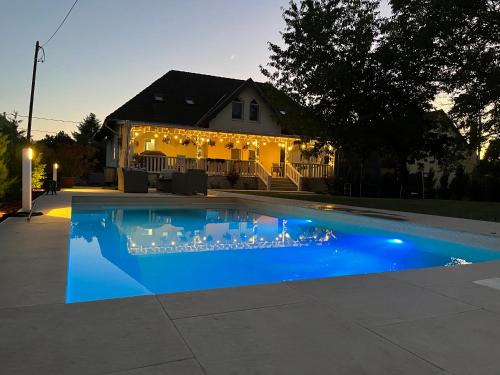 Balatonszemes House | Oceanfront Cherry Tree Cottage with Pool in Balatonszemes