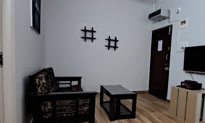 Embassy Golf Links Business Park Apartment | Cozy Chez Oly: Fully Furnished in a Green Neighborhood