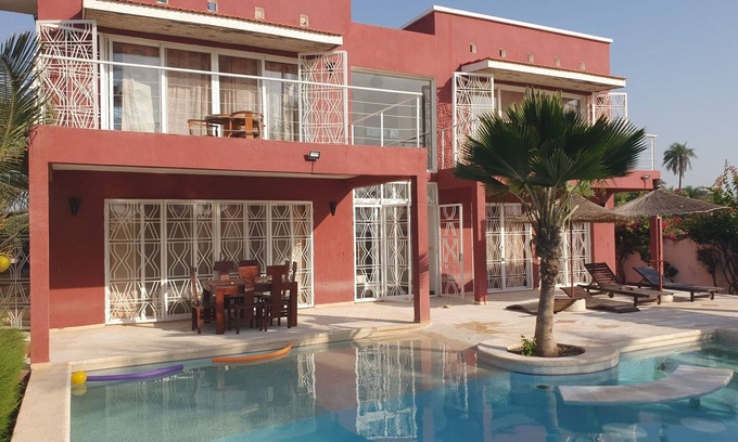 Naglou Sam Sam Villa | Chez Pierre: Poolside Paradise Near Beach & Sine Saloum